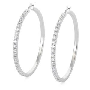 Diamond Hoop Earrings (1/4 ct. t.w.) in sterling silver.